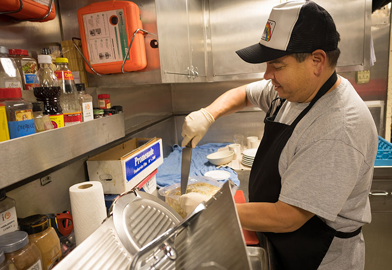 Chief Steward, Mike Sapien, hard at work, making sure the crew of 49 aboard NOAA Ship Okeanos Explorer is well fed.