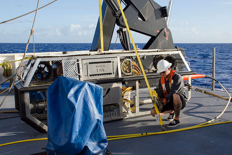 AB James Scott secures remotely operated vehicle Seirios on the deck of NOAA Ship Okeanos Explorer. 