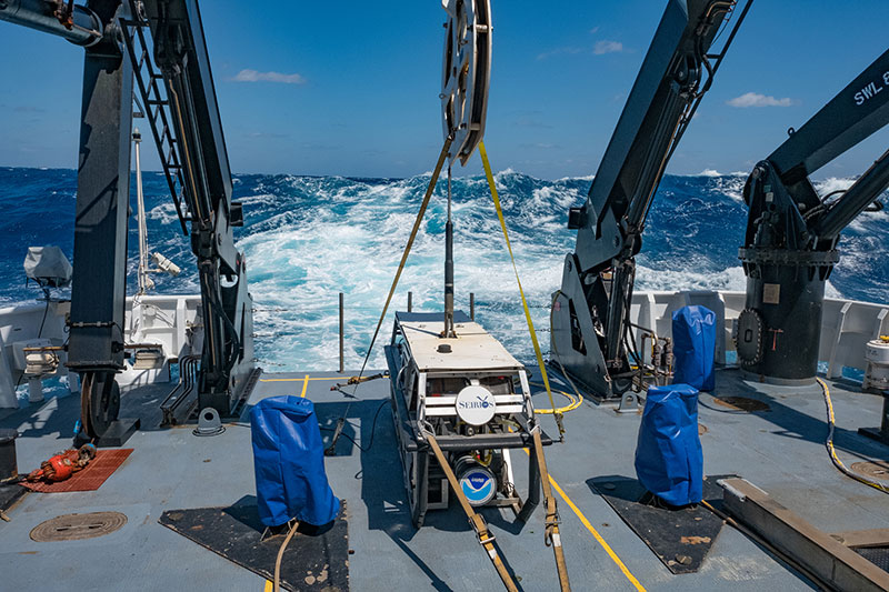 Wave behind remotely operated vehicle Seirios. With high wind and seas, the dive was canceled today. 
