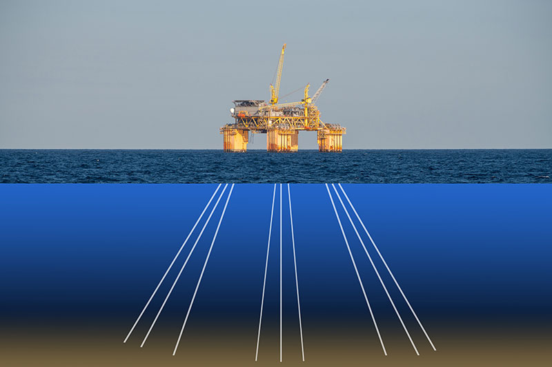 A semi-submersible oil rig is a floating platform anchored to ocean floor with strong mooring lines that can extend many nautical miles out.
