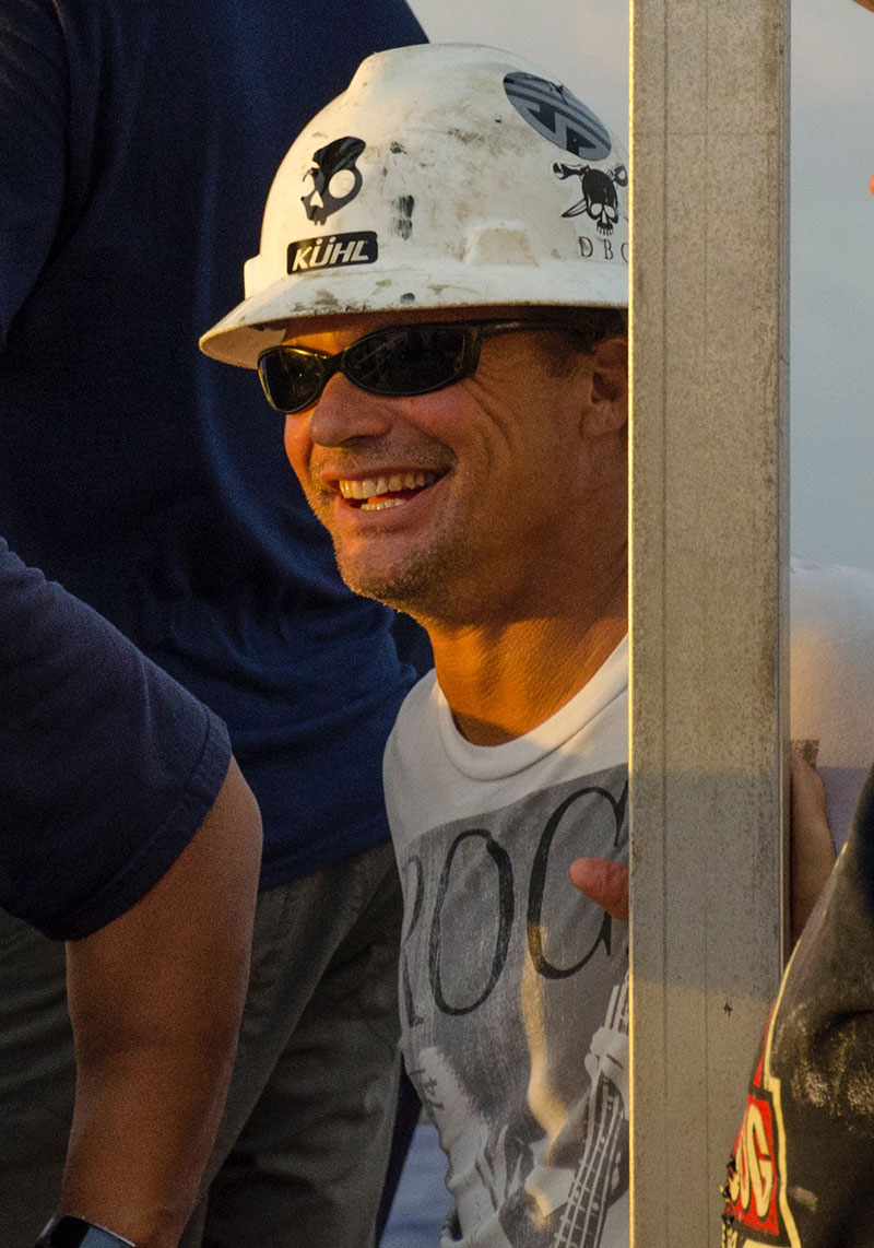 Jerrod Hozendorf, Chief Boatswain of NOAA Ship Okeanos Explorer, reminiscing with other crew members about their U.S. Navy days.