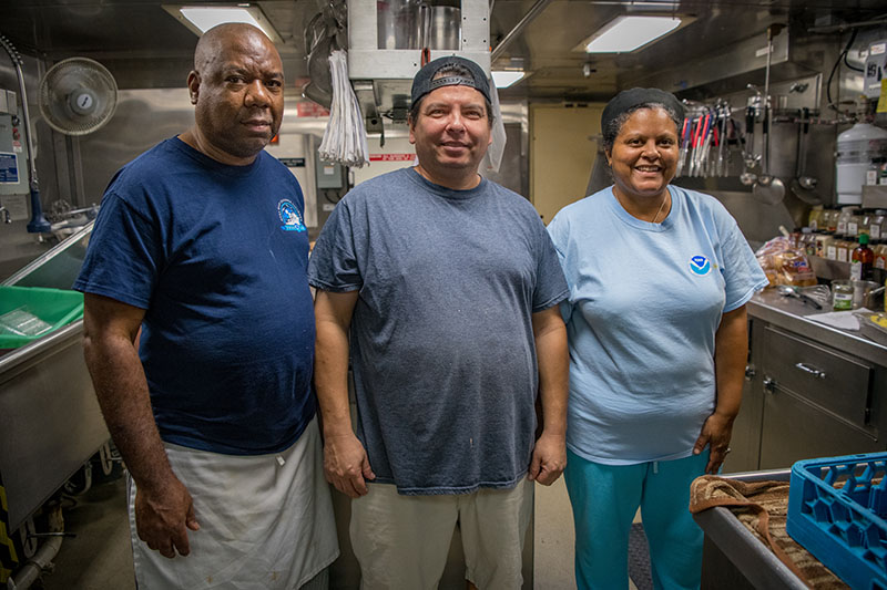 Will Johnson (2nd cook), Mike Sapien (Chief Steward) and Celeste Morris (Acting Chief Cook).