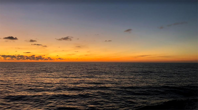 Sunset off the port side of the Okeanos Explorer.