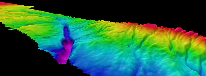 NOAA Ship Okeanos Explorer maximized its time leeward of the Grand Bahama Island while taking refuge from unfavorable weather conditions. In total, 1,700 square kilometers (656 square miles) of this area were mapped, including this meandering canyon feature.
