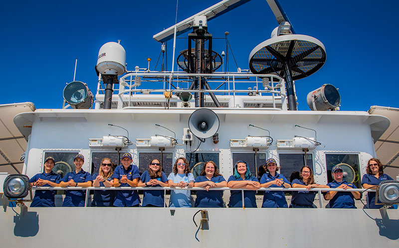 Over 25% of the mission and crew team aboard NOAA Ship Okeanos Explorer for the Windows to the Deep 2019 expedition are women, including the Commanding Office (CO), Executive Officer (XO), Operations Officer (OPS), Expedition Coordinator, Mapping Lead, and Science Leads! This is the first time this has happened onboard the Okeanos Explorer, and is a rarity amongst oceanographic research vessels.