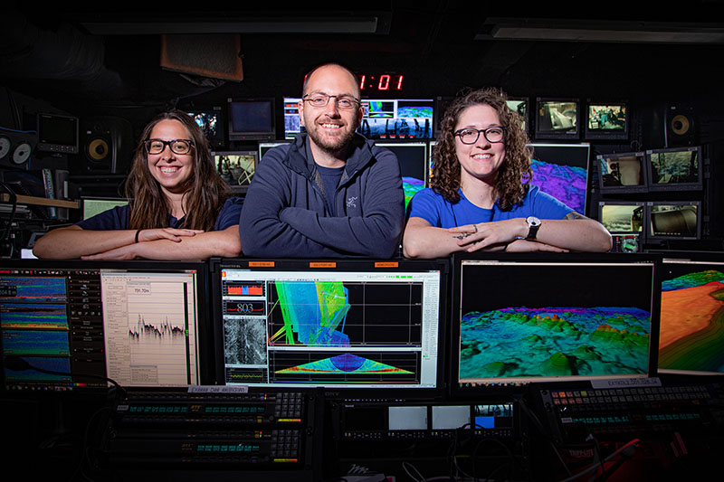 Mapping team of Windows to the Deep 2019 expedition inside the mission control room aboard NOAA Ship Okeanos Explorer.