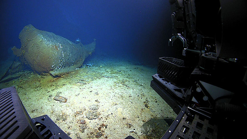A shipwreck comes into view at the start of Dive 02 of Windows to the Deep 2021. Further exploration of the wreck throughout the dive revealed that it is likely the remains of SS Bloody Marsh, an oil tanker that was sunk by a German U-boat off the coast of South Carolina in 1943.