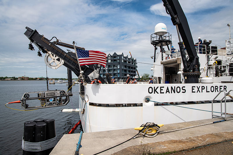 To assess operational readiness, the remotely operated vehicles (ROVs) undergo dunk tests. Here, ROV Seirios gets dunked while still in port during the 2021 ROV Shakedown