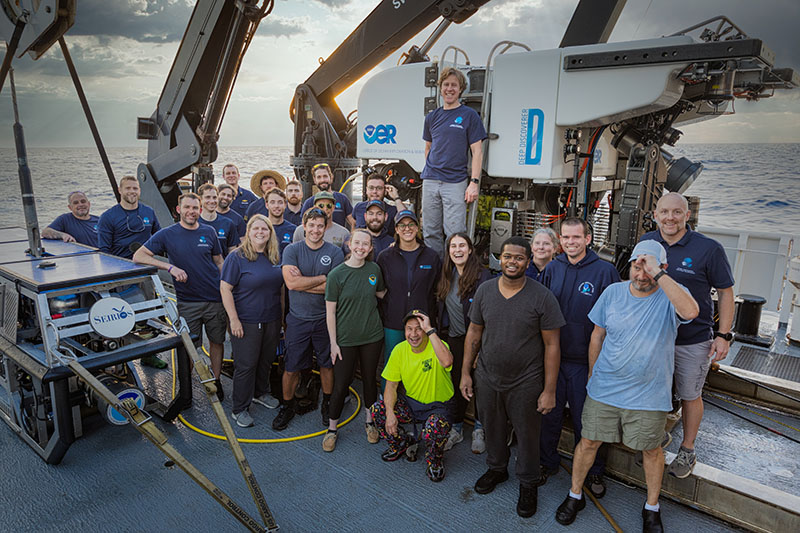 The team on the 2022 ROV and Mapping Shakedown gather to celebrate the end of a successful expedition.