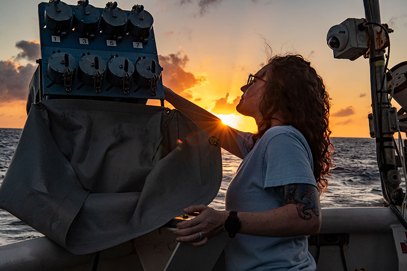 Danielle Warren with the Expendable Bathythermograph (or “XBT” for short) launcher during the 2022 Caribbean Mapping Expedition. The XBT is a probe used to measure temperature throughout the water column, generating a temperature profile. Scientists then use software that combines temparture profiles from an XBT with surface salinity data to determine an overall sound speed profile. The sound speed values can then be applied to multibeam soundings in real time for an accurate measure of bathymetry.