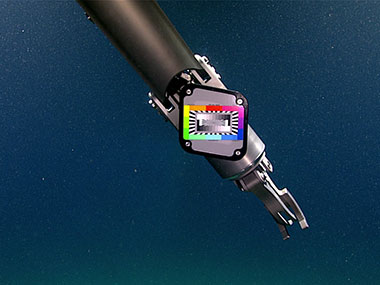 At the start of Dive 02 of the 2023 Shakedown + EXPRESS West Coast Exploration expedition, Global Foundation for Ocean Exploration engineers used a color chip chart on remotely operated vehicle (ROV) Deep Discoverer’s left manipulator arm to precisely calibrate the primary ROV cameras for color correction, providing viewers at home with accurate colors of deep-sea life. Learn more about color correction in the deep ocean.
