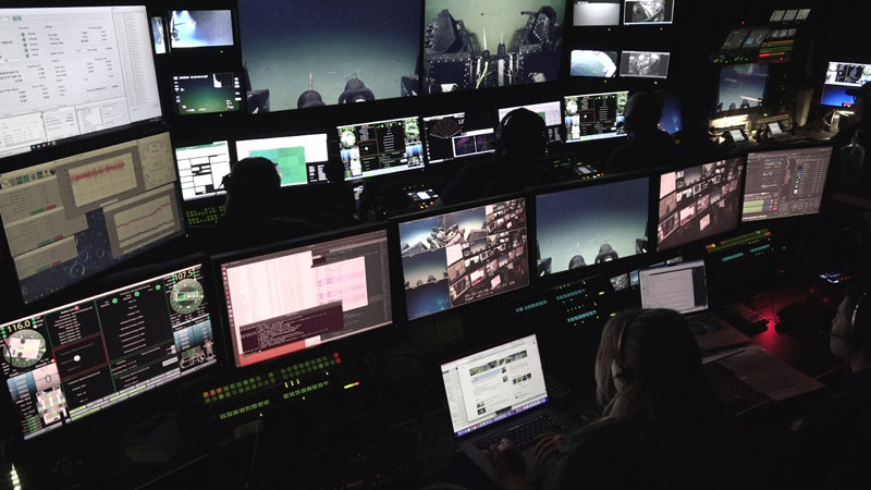 The 2023 Shakedown + EXPRESS West Coast Exploration expedition team hard at work in the control room on NOAA Ship Okeanos Explorer during the third dive of the expedition. Meet the whole on-ship team!