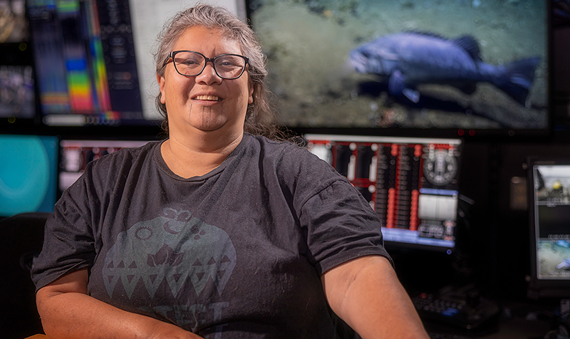 Mia Lopez from the Coastal Band of the Chumash Nation in the control room of NOAA Ship Okeanos Explorer.