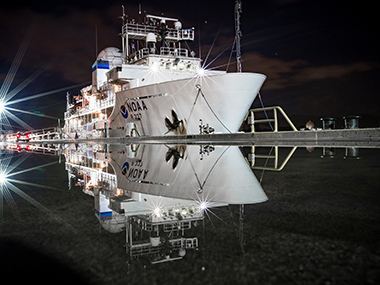 The Beyond the Blue: Papahānaumokuākea Mapping 1 expedition will begin and end in Honolulu, Hawai‘i. During in-port periods, NOAA Ship <i>Okeanos Explorer</i> will be docked at the NOAA Daniel K. Inouye Regional Center on Oahu’s Ford Island, as it was in this image from 2015.
