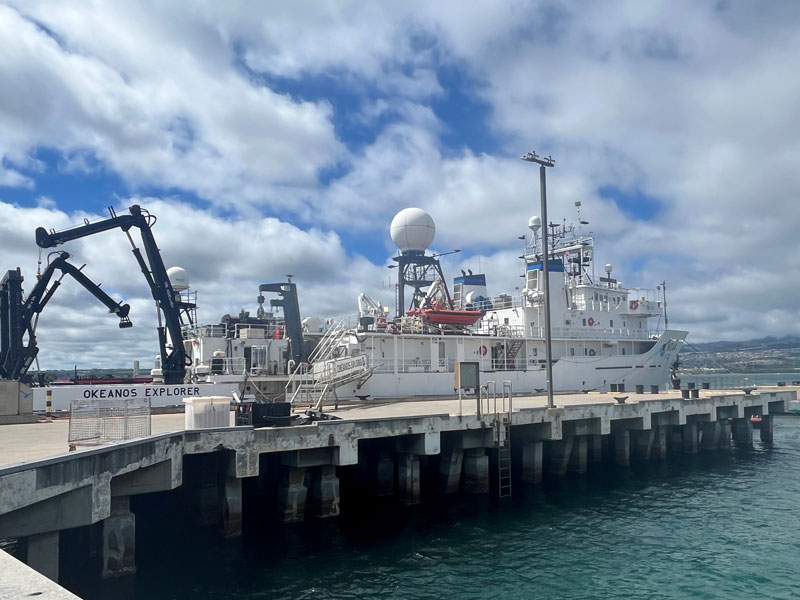 During in-port periods before and after the Beyond the Blue: Papahānaumokuākea Mapping 2 expedition, NOAA Ship Okeanos Explorer will be docked at the NOAA Daniel K. Inouye Regional Center on Oahu’s Ford Island, as it was in these images from June 2024.