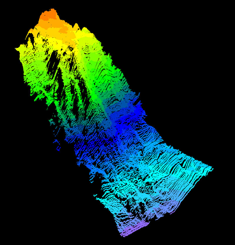 A point cloud of the seamount mapped during the Seascape Alaska 1: Aleutians Deepwater Mapping expedition, generated from acoustic data collected via multibeam echosounder. The hot colors (red, orange, and yellow) represent the newly mapped peak of the seamount at a depth of 895 meters (2,936 feet), while the cold colors (purple, teal, blue) represent the base of the seamount at a depth of around 4,000 meters (13,123 feet).