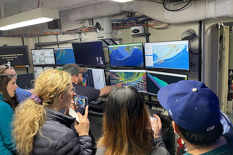 NOAA Ocean Exploration expedition coordinator Thomas Morrow explains operations to a group during a tour of NOAA Ship Okeanos Explorer while the ship was in Kodiak.