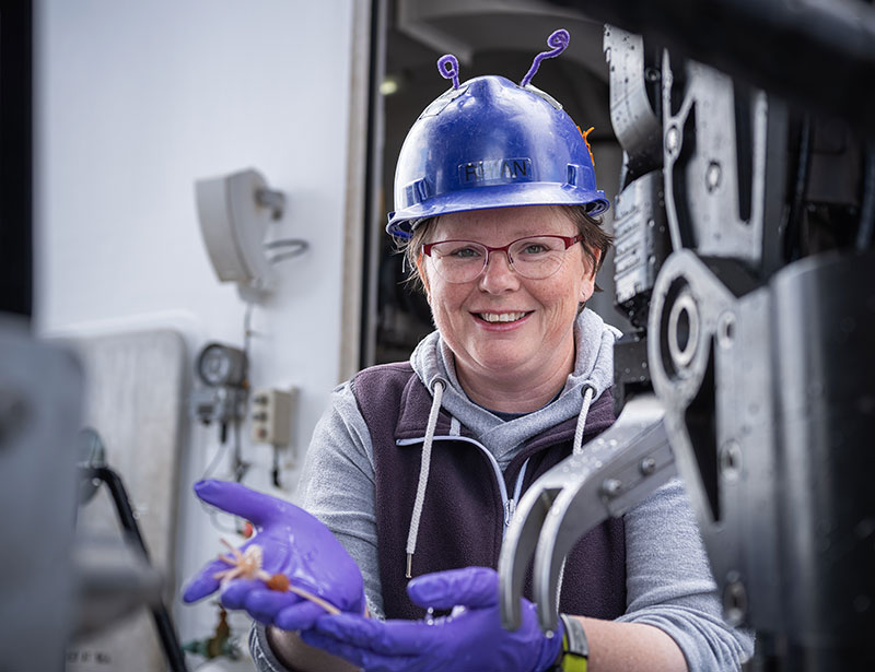 Seascape Alaska 3 expedition biology science lead Rhian Waller with an interesting carnivorous sponge collected during the second dive of the expedition.