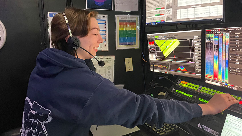 Explorer-in-Training Ingrid Martinson participates in mapping data collection in the control room aboard NOAA Ship Okeanos Explorer.