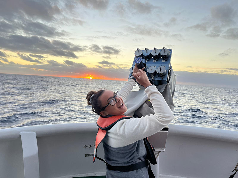 Jennifer Clifton, Explorer-in-Training, reloads an expendable bathythermograph (XBT) to collect ocean temperature data. Image courtesy of NOAA Ocean Exploration, EXPRESS: West Coast Mapping 2022.