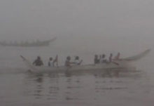 image of canoes in the fog