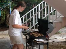 girl scouts prepare dinner