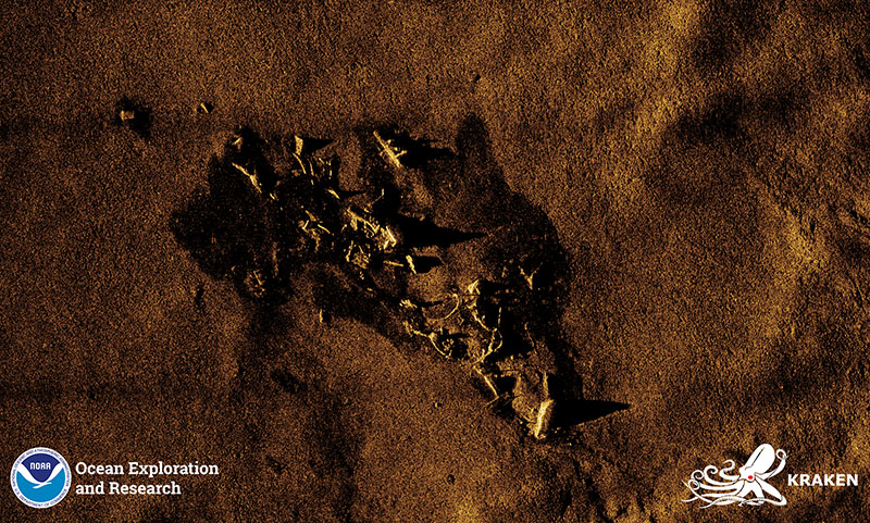 Synthetic Aperture Sonar image of the <em>USS G-1</em> collected by the KATFISH™ system. Salvage work in the 1960s appears to have caused considerable damage to the G-1, leaving a heavily disturbed shipwreck marked by large debris.