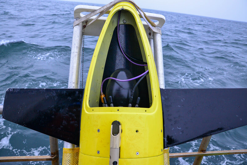 Oil bladder used to control the buoyancy of the Seaglider being used during the Coordinated Simultaneous Physical-Biological Sampling Using ADCP-Equipped Ocean Gliders expedition. This bladder appears fully inflated (bulb in the middle of the open hatch), meaning it is full of oil and would move the Seaglider up in the water column if the vehicle was underwater.