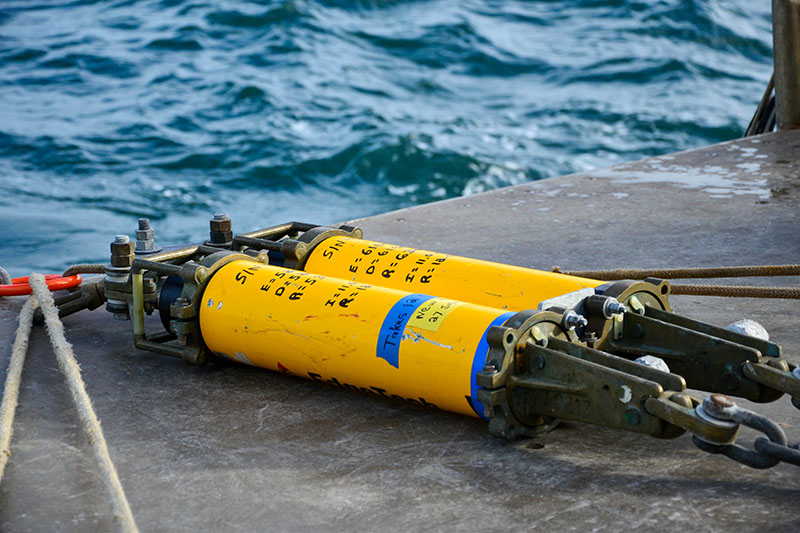 Ever wonder how scientists recover instruments that are fixed to the seafloor? This device is called an acoustic release and it was attached to the acoustic echosounder deployed during the Coordinated Simultaneous Physical-Biological Sampling Using ADCP-Equipped Ocean Gliders expedition. To do this, scientists aboard a research vessel will send an acoustic signal to the release, letting it know that it is time to detach. Once this signal is received, this acoustic release will detach from the weight that is keeping the system moored to the seafloor, sending the whole system flying to the water’s surface.