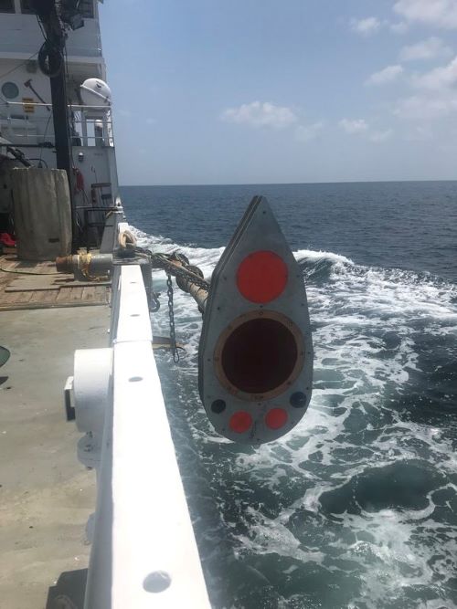 The transducer pod holds the four frequencies (18 kHz, 38 kHz, 70 kHz, and 120 kHz) of transducers, seen here as orange circles, that are used to sense mesopelagic communities from the ocean surface.