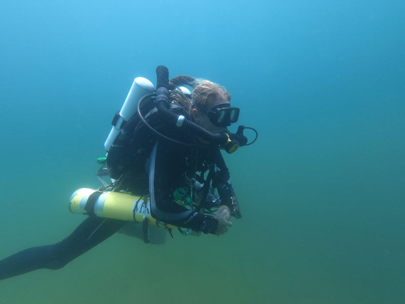 An East Carolina University dive safety officer using closed-circuit diving equipment (rebreather) during a training dive.