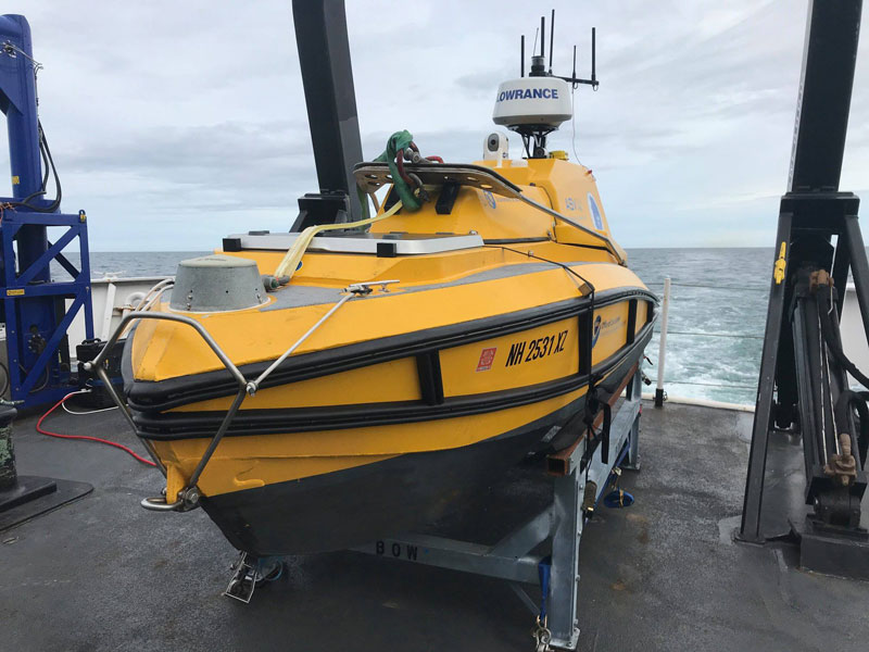 C-Workers are a family of uncrewed surface vessels (USV) used for a variety of applications with varying levels of autonomy. The USV shown here is a custom-built C-Worker 4, the smallest of the C-Workers. This 4.2-meter (14-foot) diesel-powered, shallow-water USV is equipped with standard mapping equipment. NOAA has deployed it from a NOAA ship to map portions of Alaska’s Arctic seabed and from shore to map portions of Thunder Bay National Marine Sanctuary’s lakebed while also searching for shipwrecks.