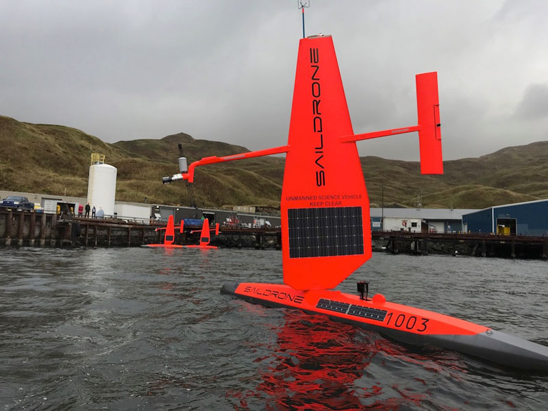 Predominantly powered by wind and solar energy, Saildrone uncrewed surface vessels (USVs) are capable of operating in harsh and remote environments for extended periods of time, from three months up to a year, with minimal supervision, collecting and transmitting oceanic and atmospheric data to shore in real time. The three current Saildrone USV models range in length from 7 to 22 meters (23 to 72 feet) with varying payloads and capabilities. NOAA has used Saildrone USVs in the Arctic, Pacific, Atlantic, and Southern oceans to track fish and mammals, measure ocean acidification and carbon dioxide, map the seafloor, and observe oceanic and atmospheric interactions from inside a hurricane.
