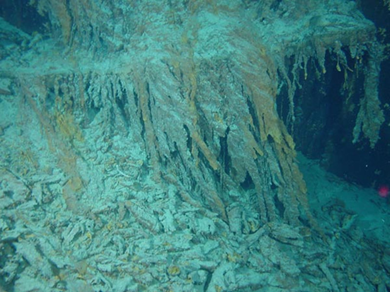 Detached rusticles below port side anchor indicating that the rusticles pass through a cycle of growth, maturation and then fall away. This particular “crop” probably was in a five to ten year cycle.