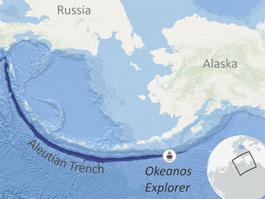 A map of the Aleutian Trench, which spans approximately 3,400 kilometers (2,100 miles). The icon for NOAA Ship Okeanos Explorer is shown where the ship first traversed over the trench during the Seascape Alaska 1: Aleutians Deepwater Mapping expedition.