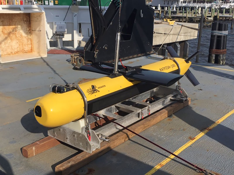 Photo of KATFISH on deck. The fins allow for operator adjustments (side-to-side and up/down) along track during a survey. Credit B. Eakins, CU Boulder and NOAA NCEI.